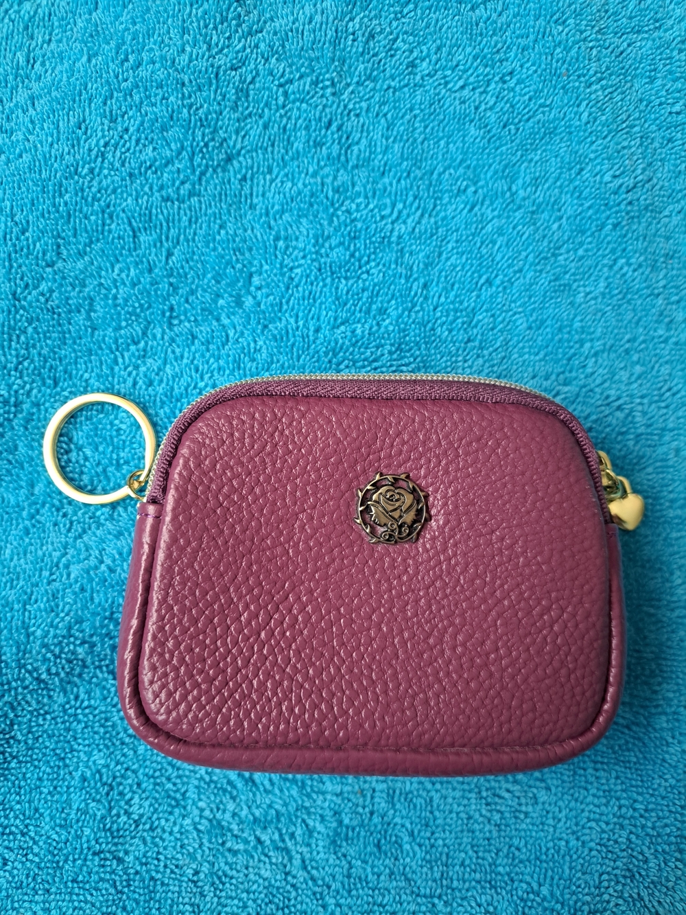 Plum Pebbled Leather Mini Zip Pouch with Gold Rose Emblem